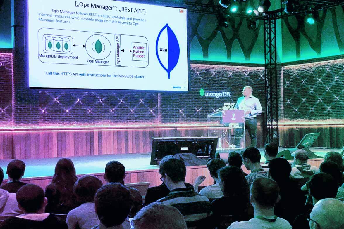 Community Champion giving a presentation in front of an audience at a MongoDB event